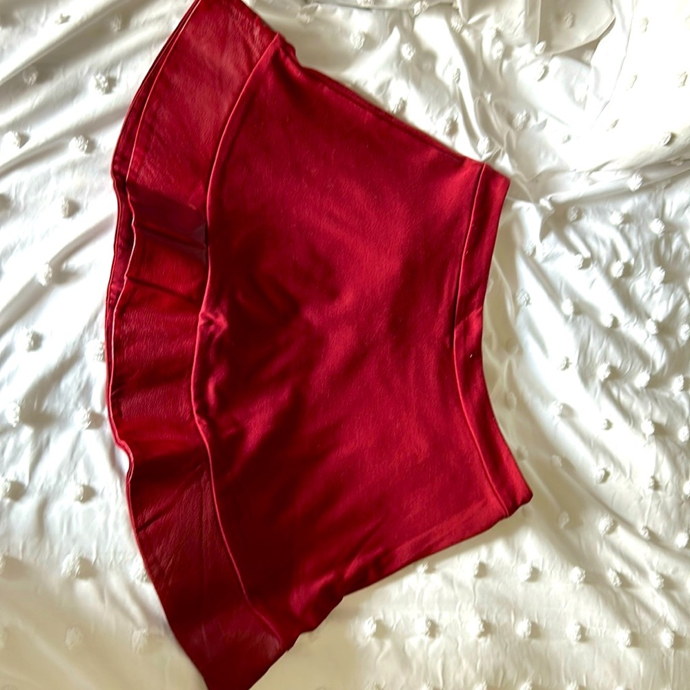 IMAN skater skirt with leather trim.